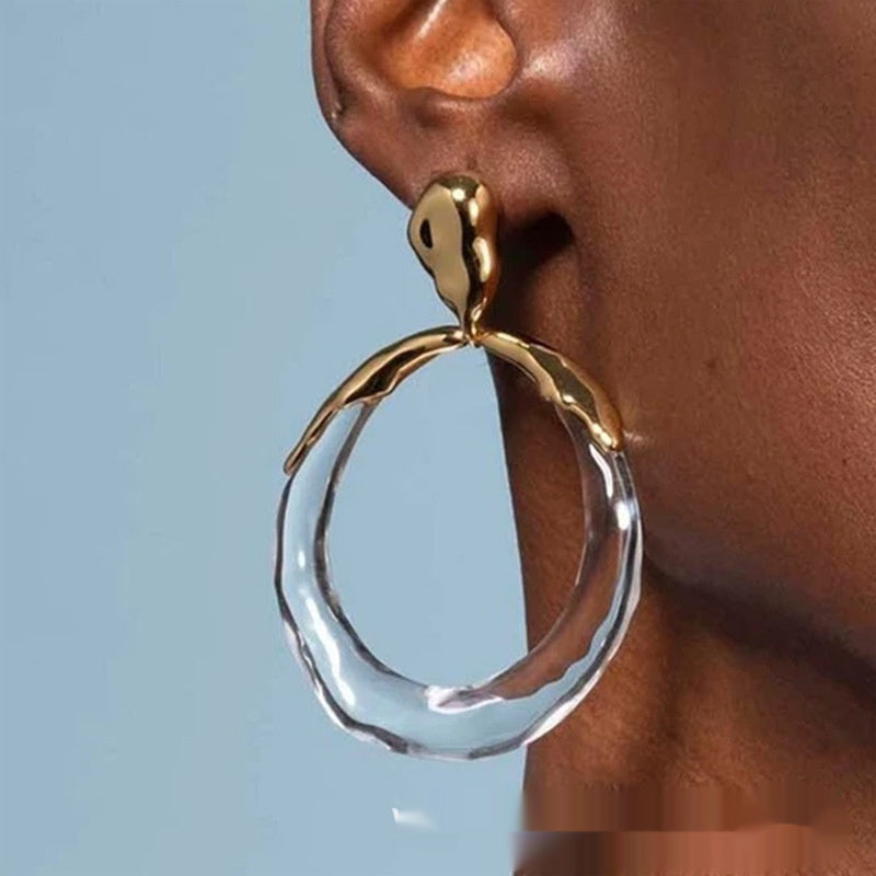 Orecchini a bottone: di design, alla moda, eleganti