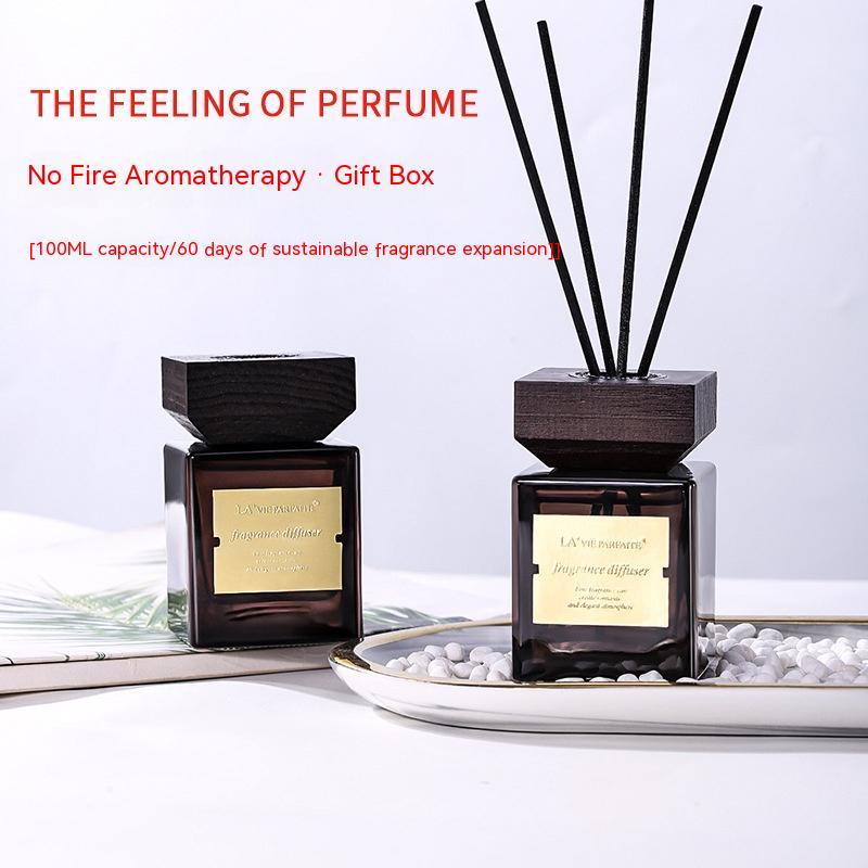 Diffusore a bastoncini in rattan con coperchio in legno e oli essenziali "Hotel Fragrance"