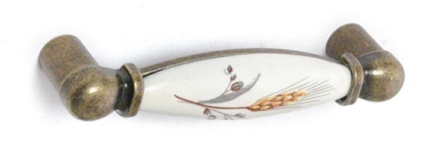 Maniglia avorio in ceramica con base bronzata e decoro