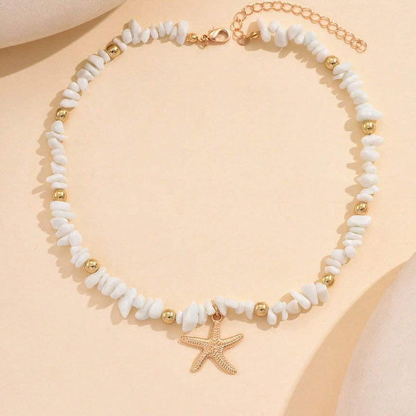 Collana con clavicola in ciottoli irregolari e motivo a stella marina