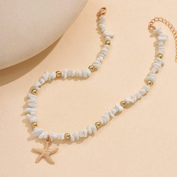 Collana con clavicola in ciottoli irregolari e motivo a stella marina